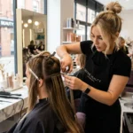 Best Beauty salon_ Female_stylist_applying_hair