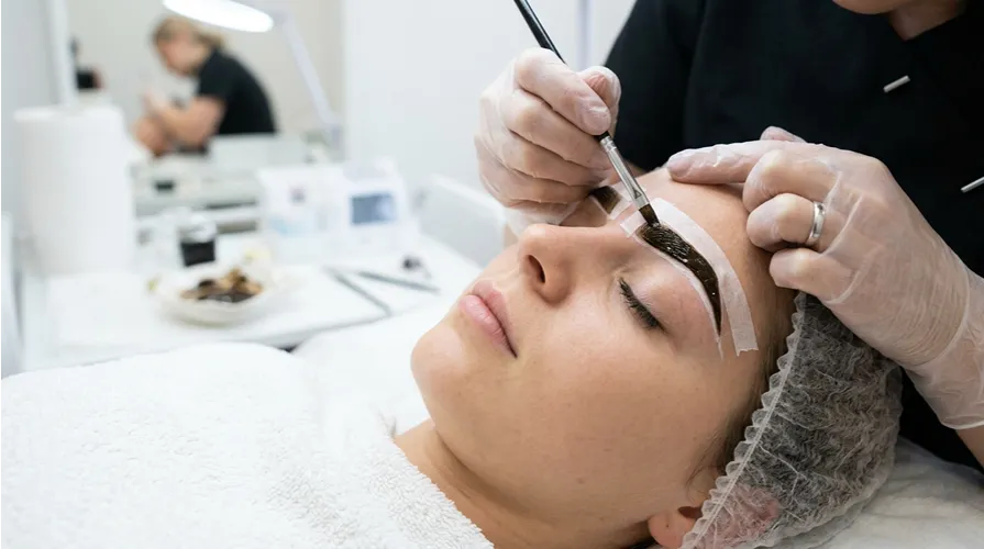 Henna brows vs regular tint comparison on client eyebrow